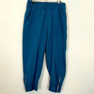 Apana cropped peacock blue joggers. Size Large